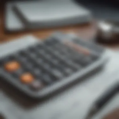 Calculator with financial documents symbolizing tax calculations