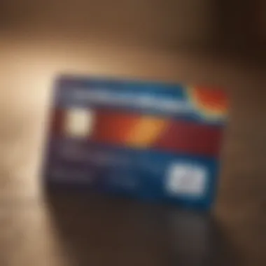 Close-up of a credit card with vibrant rewards program graphics